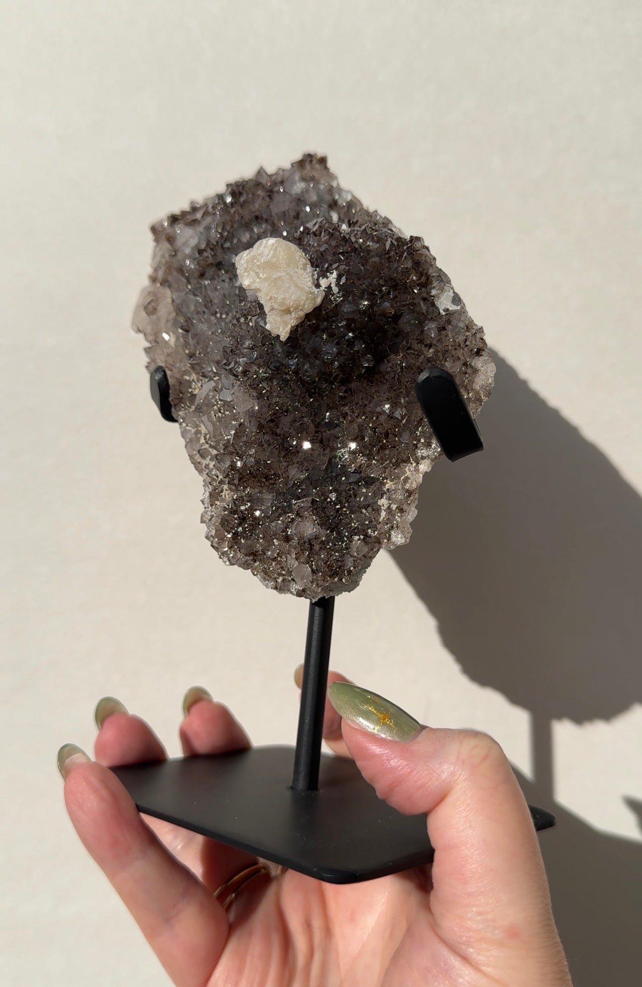 Rainbow Amethyst on stand with Calcite