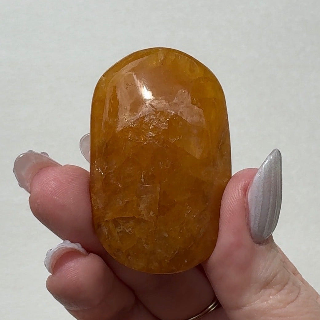 Golden Healer Palmstone | F