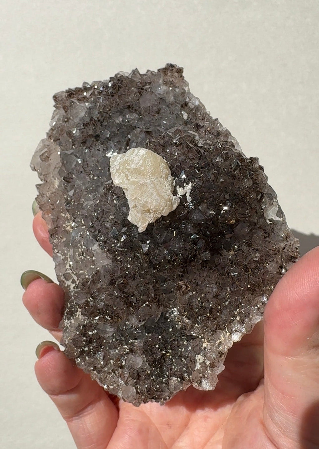 Rainbow Amethyst on stand with Calcite