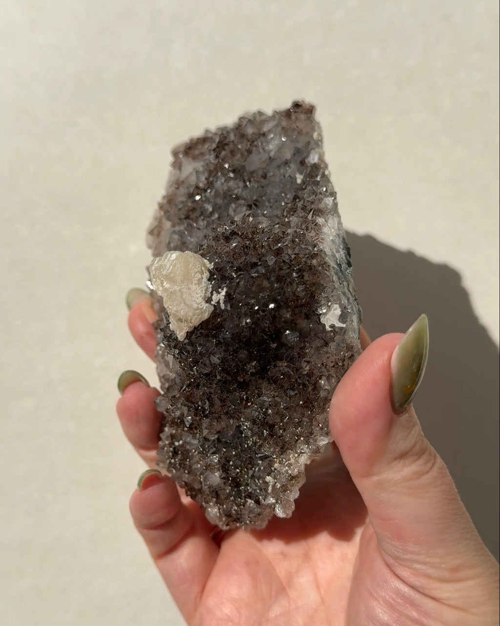 Rainbow Amethyst on stand with Calcite