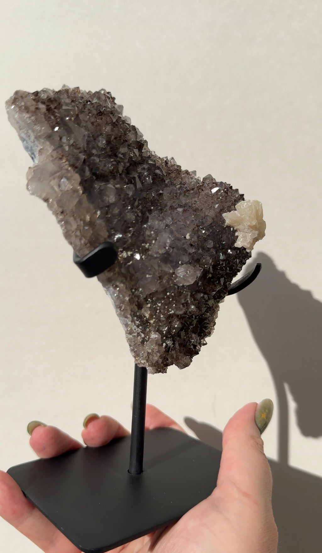 Rainbow Amethyst on stand with Calcite